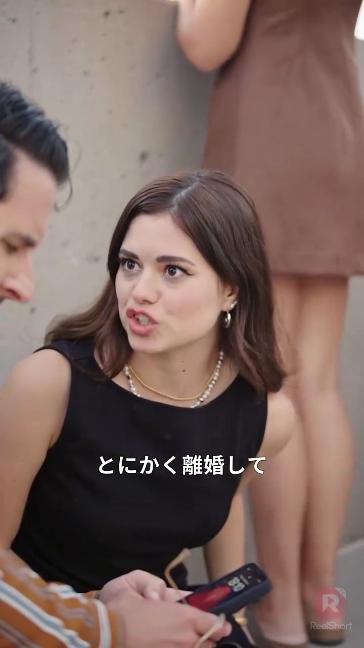 不倫夫の筆を折る写真