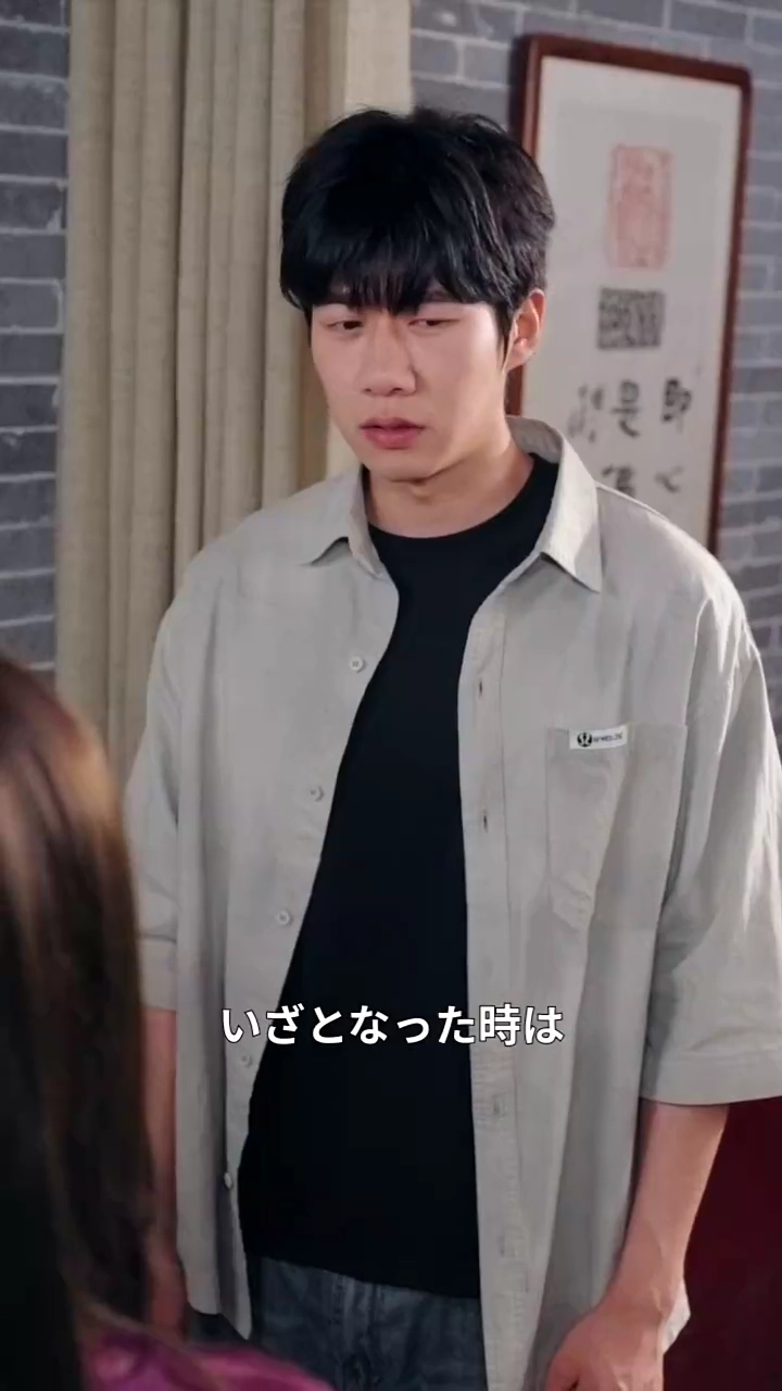 兄の背後で写真